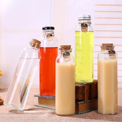 China supplier 300ml 10oz tall empty glass juice bottles with cap