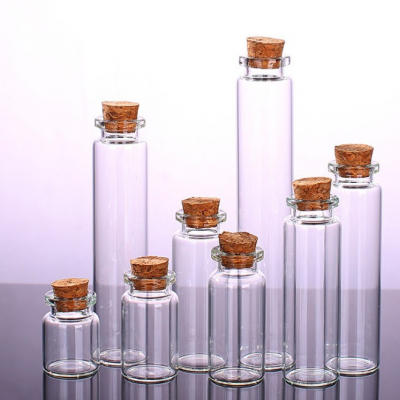  Add to CompareShare Mini Small Tiny Wishing Glass Bottles Vial with Cork Stopper Storage Vials 