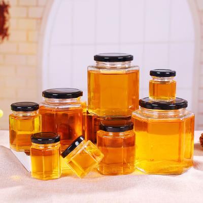 wholesale 650ml bee hexagon empty glass jar container for honey 